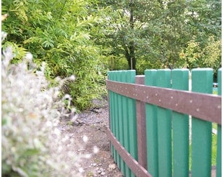 Recycled plastic green picket fencing