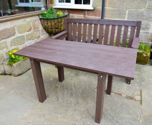 Wirksworth table and dale bench set in a courtyard garden