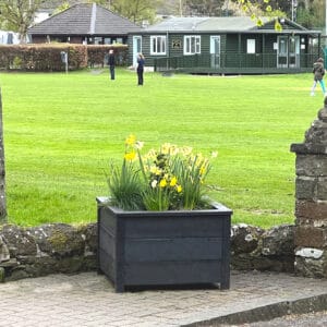 TDP Recycled Plastic Ipstone planter in Melrose, Scottish Boarders outside a park
