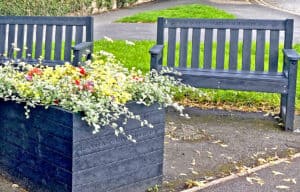 2 seater commemorative Dale benches and a planter all engraved at Darley Dale in Derbyshire