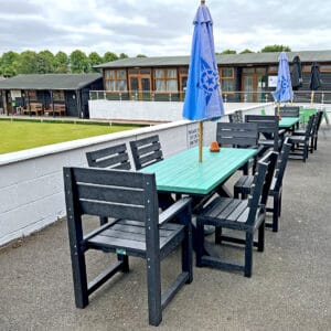 Wheatcroft six seater outdoor dining table with two Belper and four Cromford Chairs at Heanor Miners Welfare club 1