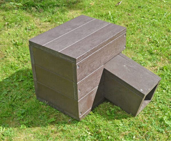 TDP Recycled Plastic Hedgehog House in Brown on grass